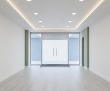 Retail unit turnover concept with refreshed flooring, updated lighting, painted walls, and an improved entry ready for tenant fit-out